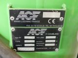an image of a close up of a sign on a green machine