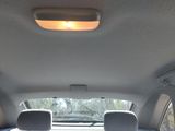 the interior of a car with the sun shining through the window