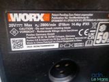 a close up of a black and white label on a machine