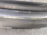 a close up of the front bumper of a car