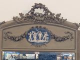 a mirror that has a picture of a man and a woman on it