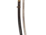 an old dagger with a wooden handle and brass fittings