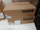 two boxes that are sitting on a table next to each other