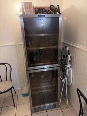 an image of a stainless steel refrigerator in a kitchen