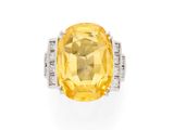 a yellow sapphire and diamond ring