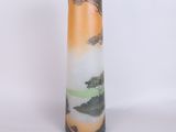 a tall vase with a painting on it sitting on a table