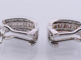 pair of diamond earrings in 18k white gold