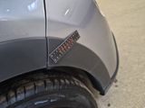 a close up of a car with a sticker on the side of it