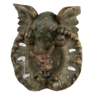 an image of a statue of a winged head