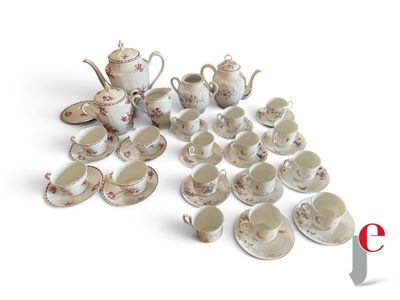 a lot of coffee cups and saucers on the table