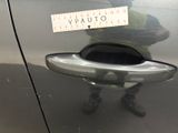 a sticker on the door of a car with a sticker on it
