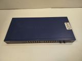 a close up of a blue box on a white surface