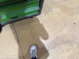 a person that is standing on a skateboard on the ground