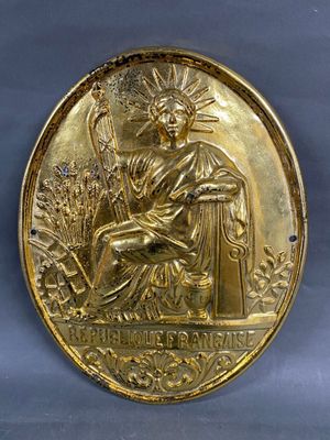 une image représentant une médaille d'or sur laquelle figure Jésus