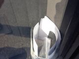 a close up of a cup on a window sill