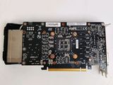 an image of a close up of a video card with a lot of screws on it