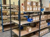 many boxes and boxes on the shelves in the warehouse