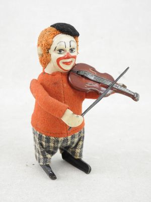 un clown jouant du violon sur un fond blanc