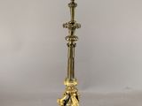 pair of antique brass candlesticks with cherenshes and cherenshes on them