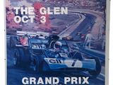 a poster of a grand prix race car on display