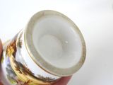 a person holding a cup with a picture on it