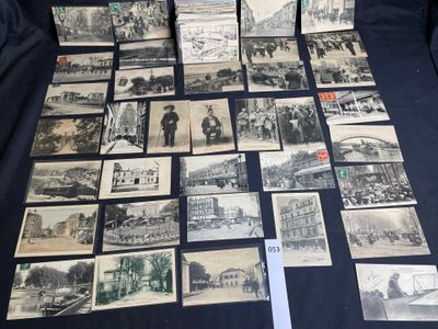a lot of old black and white photos on the table