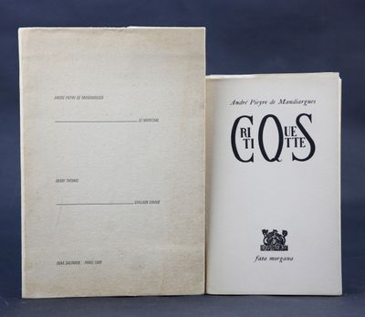 an open book sitting on top of a table next to a blue background