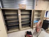 a room with a lot of shelves and a chair