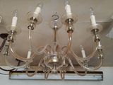 a chandelier hanging from the ceiling in a room
