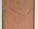 an image of a picture of a box with a string on it
