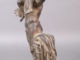 an image of a statue of a woman holding a bird