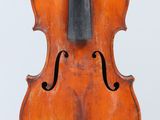 an old violin with a bow on a white background