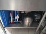 a ball that is sitting on a shelf in the kitchen
