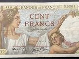 an old french bank note with a picture of a woman and child on it