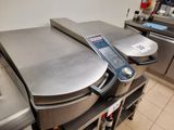 an image of a commercial pizza oven in a commercial kitchen