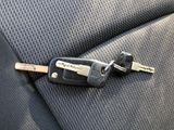 a car key in the back seat of a car