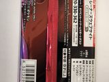 a red packet with a black and white sticker on it