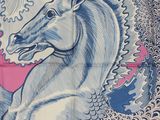 a blue and pink scarf with a horse on it