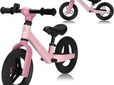 a pink bike that is sitting next to each other