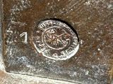 a close up of a metal object with a sign on it