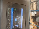 an image of a refrigerator with a digital screen on it