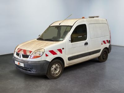 a white van with red stripes parked in a room