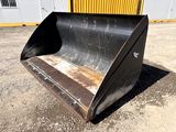 a black bucket that is sitting in the dirt