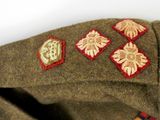 a close up of a jacket with patches on it