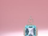 an image of a blue topaz stone and diamond pendant on a pink background