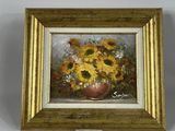 a picture of a painting of sunflowers in a vase