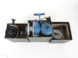 a box with a blue reel and a blue spooler in it