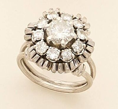 an image of a diamond clusterer ring on a white background
