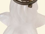 a lamp that has a bird on top of it