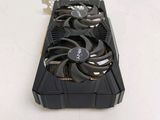 a close up of a video card with a fan on it